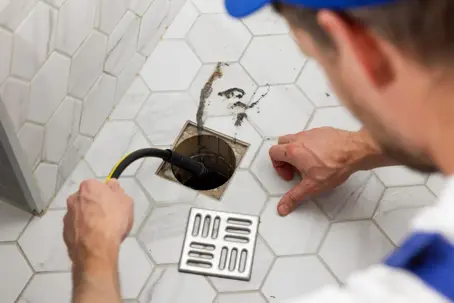 working on a drain